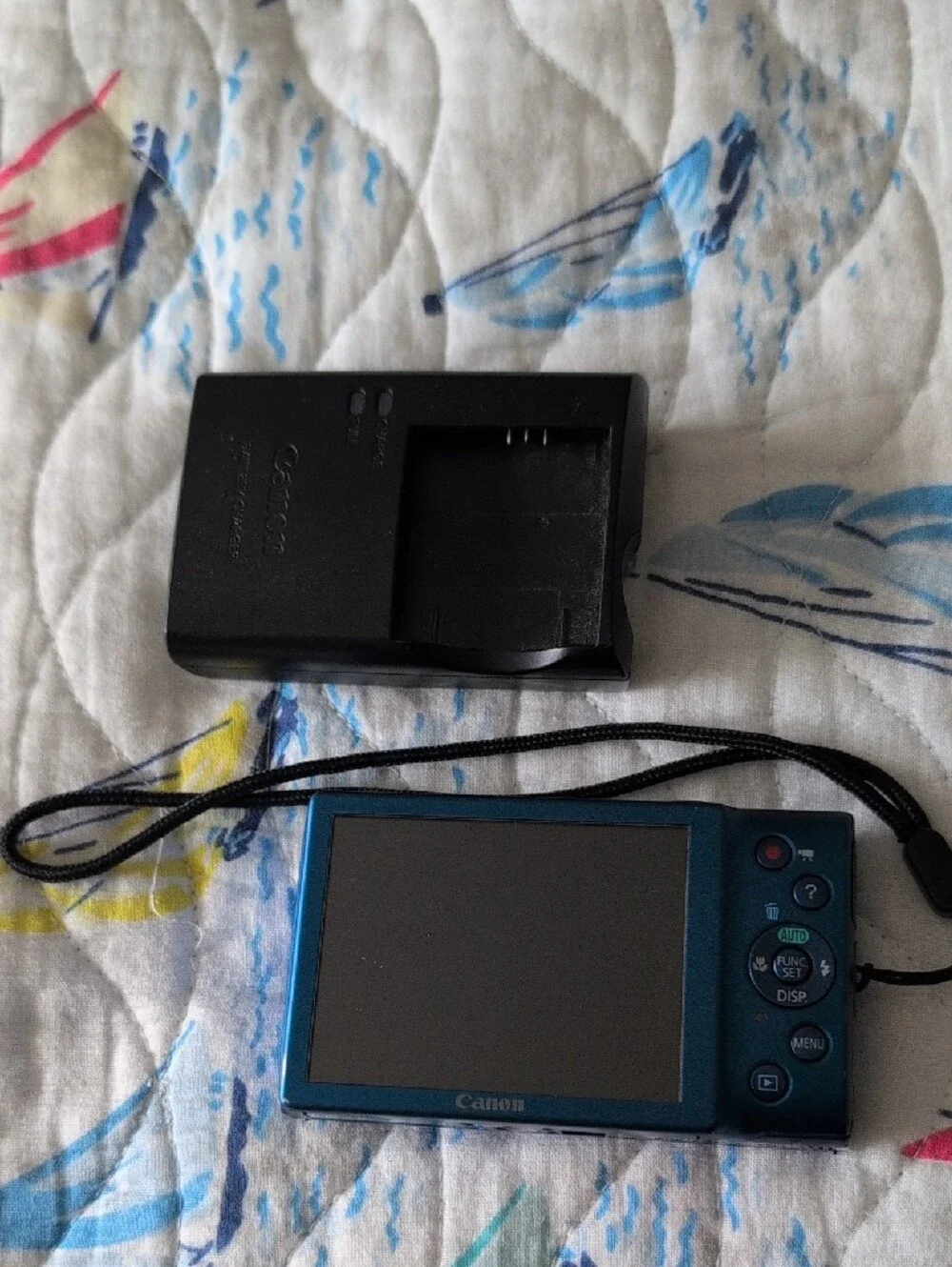 Canon Blue Compact Digital Camera with Wrist Strap and Charger